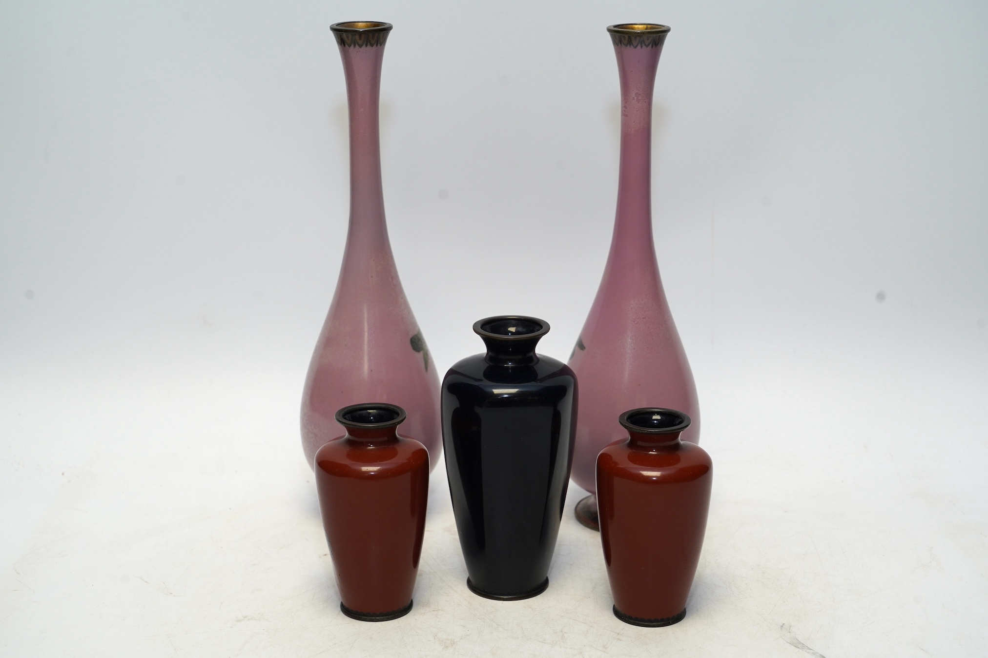 Two pairs and another Japanese cloisonné vases, Meiji period, tallest 25cm. Condition - two vases restored